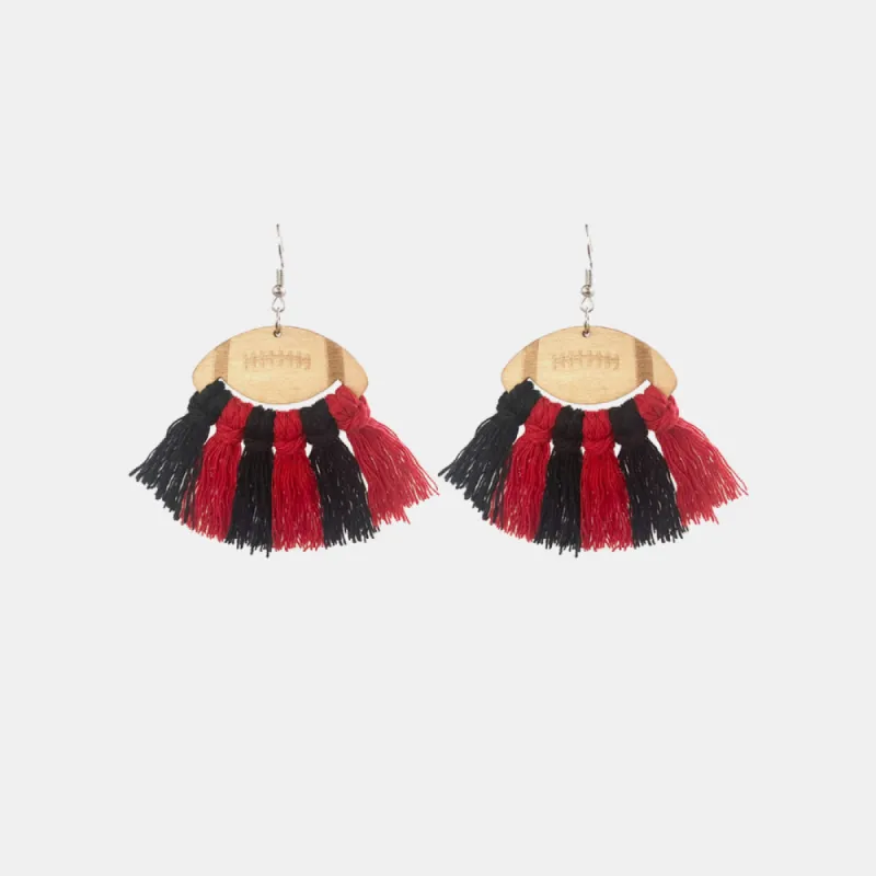 Fringe Detail Football Shape Wooden Dangle Earrings sold by Charming Charlie