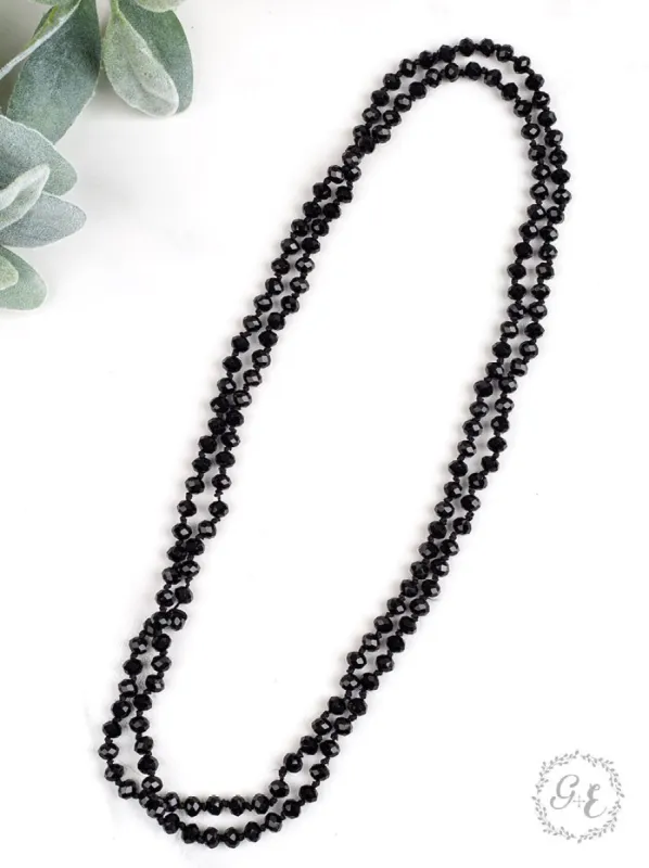 The Essential 60" Double Wrap Beaded Necklace, Black 8mm sold by Charming Charlie