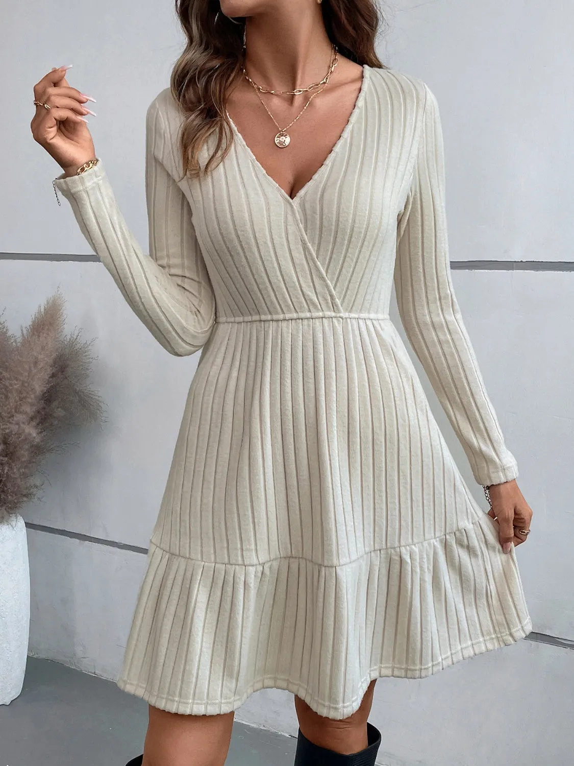 Ruffle Hem Surplice Long Sleeve Dress sold by Charming Charlie
