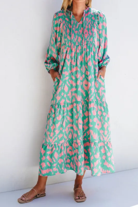 Smocked Printed Tie Neck Long Sleeve Dress sold by Charming Charlie