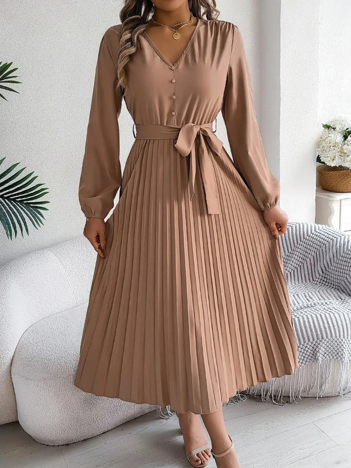 Pleated Tied V-Neck Long Sleeve Dress sold by Charming Charlie