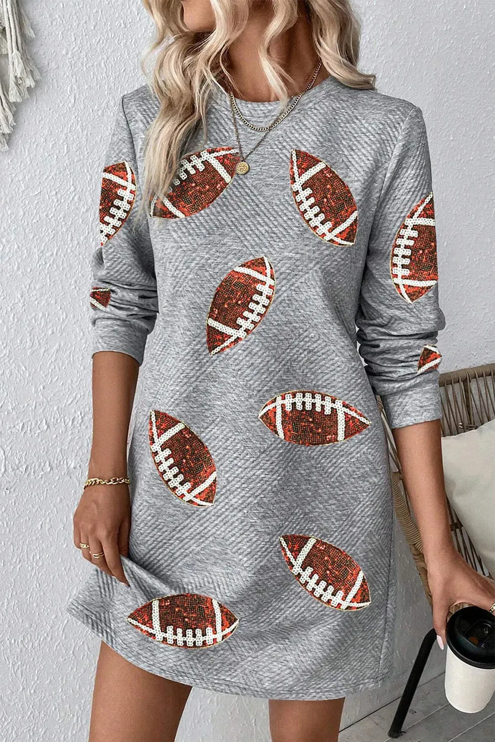 Sequin Football Long Sleeve Mini Dress sold by Charming Charlie