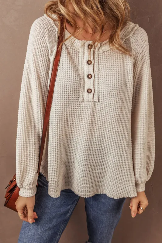 Waffle-Knit Half Button Round Neck Long Sleeve Top sold by Charming Charlie