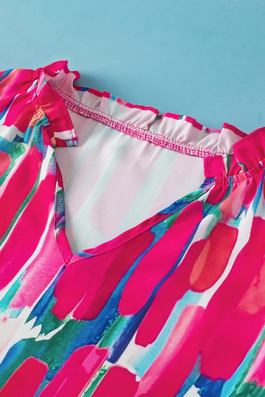 Ruffled Printed Notched Cap Sleeve Blouse sold by Charming Charlie product image thumbnail 4