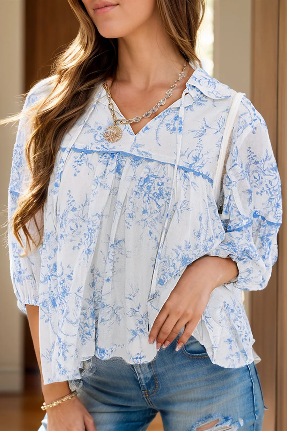 Printed Tie Neck Three-Quarter Sleeve Blouse sold by Charming Charlie