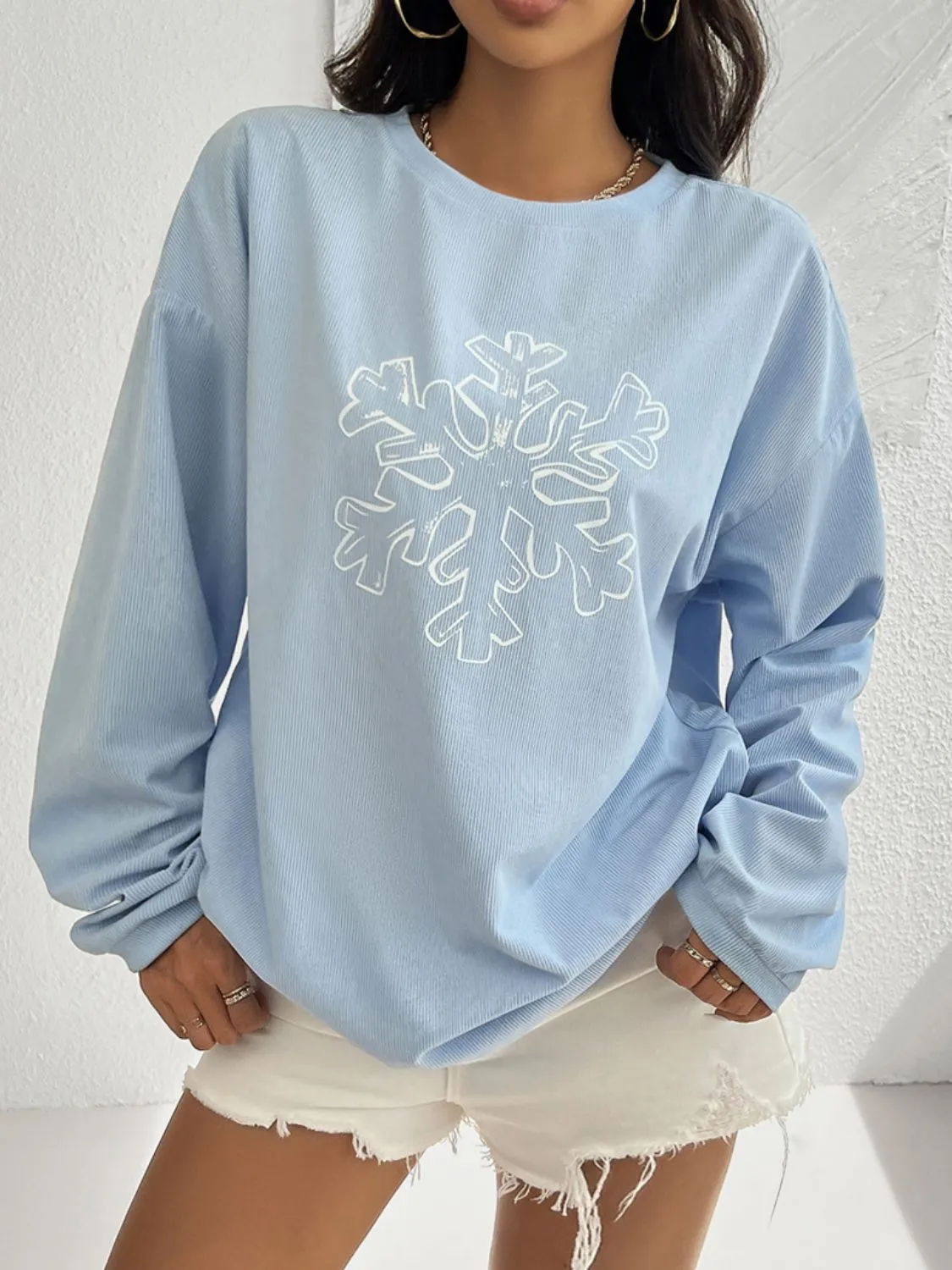 Devine Snowflake Graphic Long Sleeve Sweatshirt sold by Charming Charlie