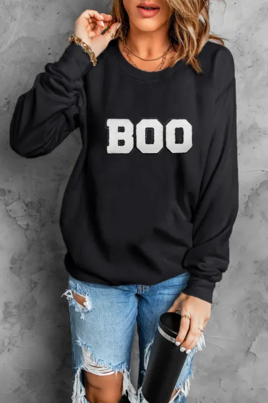BOO Round Neck Long Sleeve Sweatshirt sold by Charming Charlie