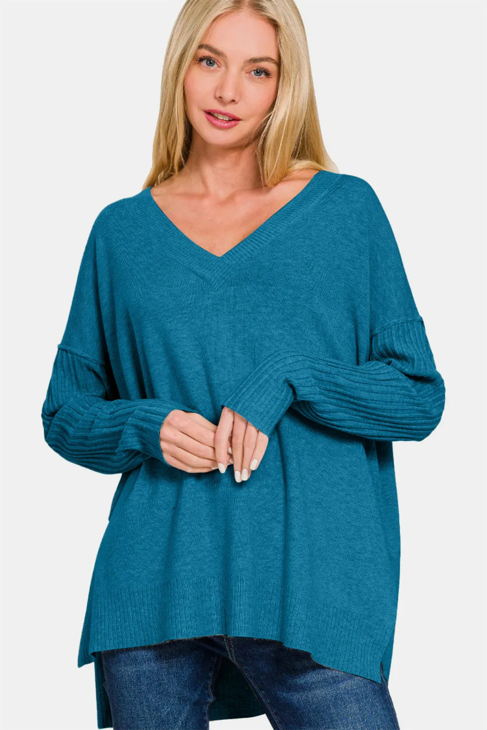 Zenana V-Neck Side Slit High-Low Sweater sold by Charming Charlie