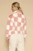 Fuzzy checkered zip front jacket sold by Charming Charlie