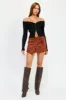 WRAPPED BUCKLE BELT MINI SKIRT sold by Charming Charlie