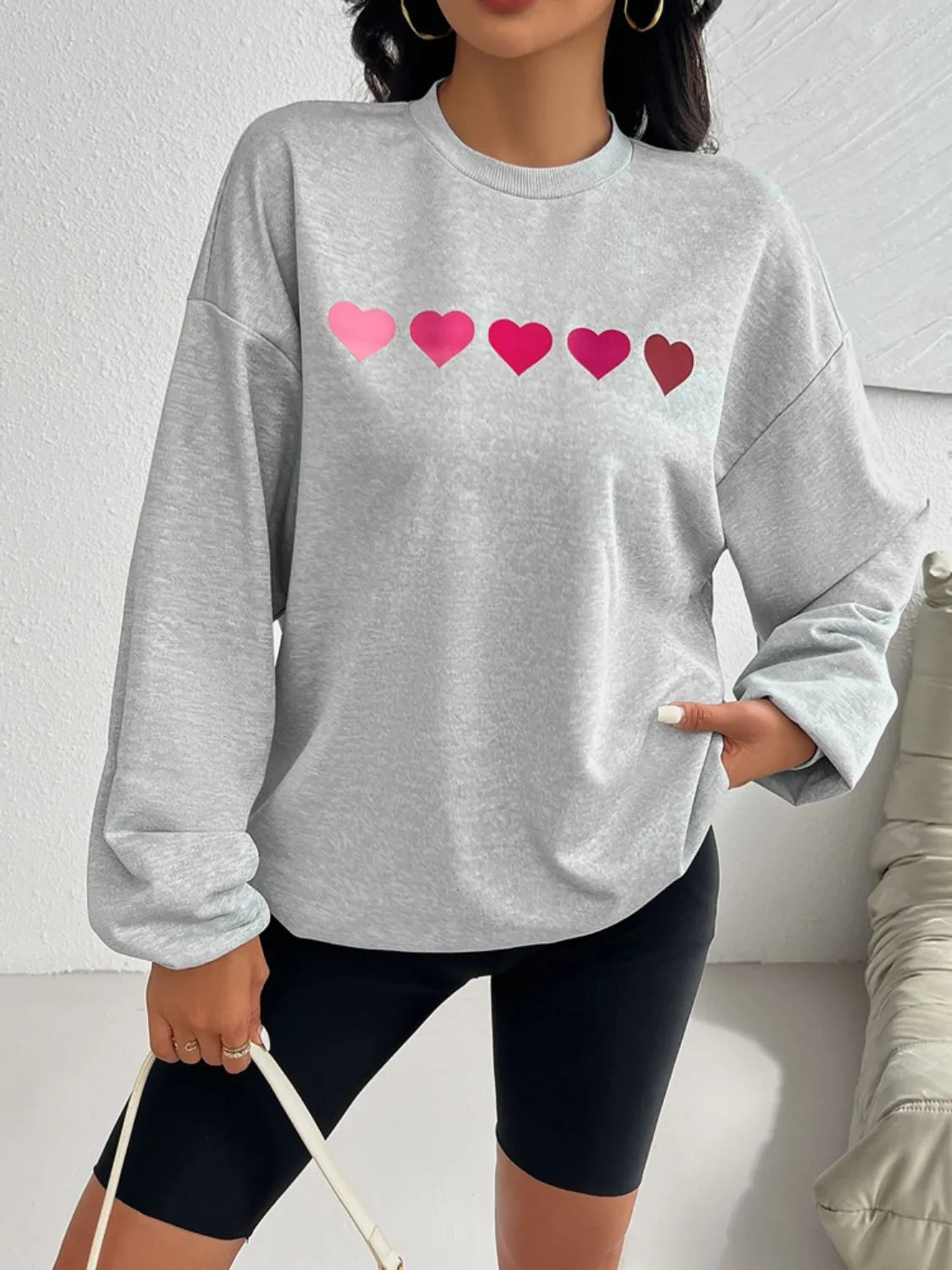 Devine Heart Dropped Shoulder Long Sleeve Sweatshirt sold by Charming Charlie product image thumbnail 3