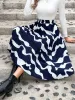 Pleated Printed Elastic Waist Skirt sold by Charming Charlie