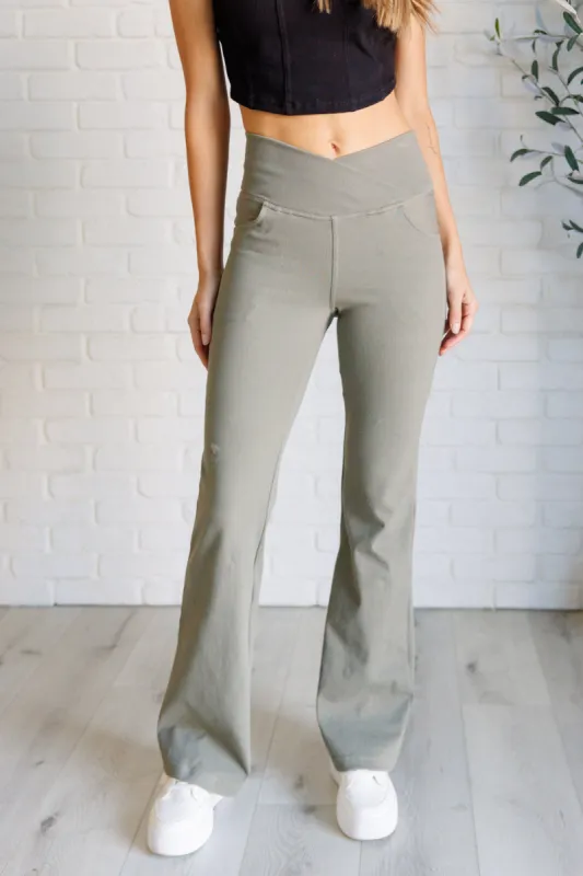 Building Habits Twill Flared Crossover Waist Pant in Dusty Olive sold by Charming Charlie