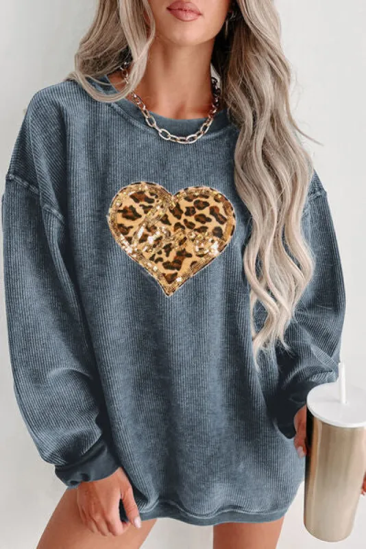 Heart Leopard Sequin Round Neck Sweatshirt sold by Charming Charlie