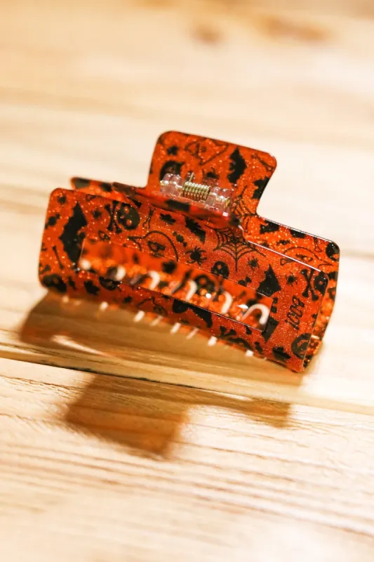 Orange Glitter Halloween Hair Claw sold by Charming Charlie