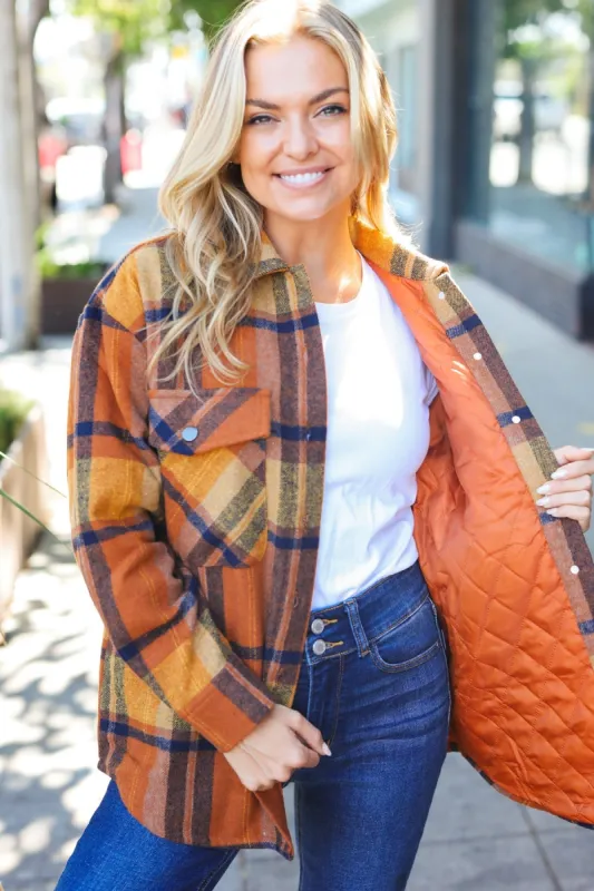 You Got This Camel Plaid Quilt Lined Button Down Shacket sold by Charming Charlie