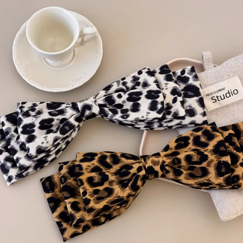 2 Piece Leopard Bow Hair Clip sold by Charming Charlie