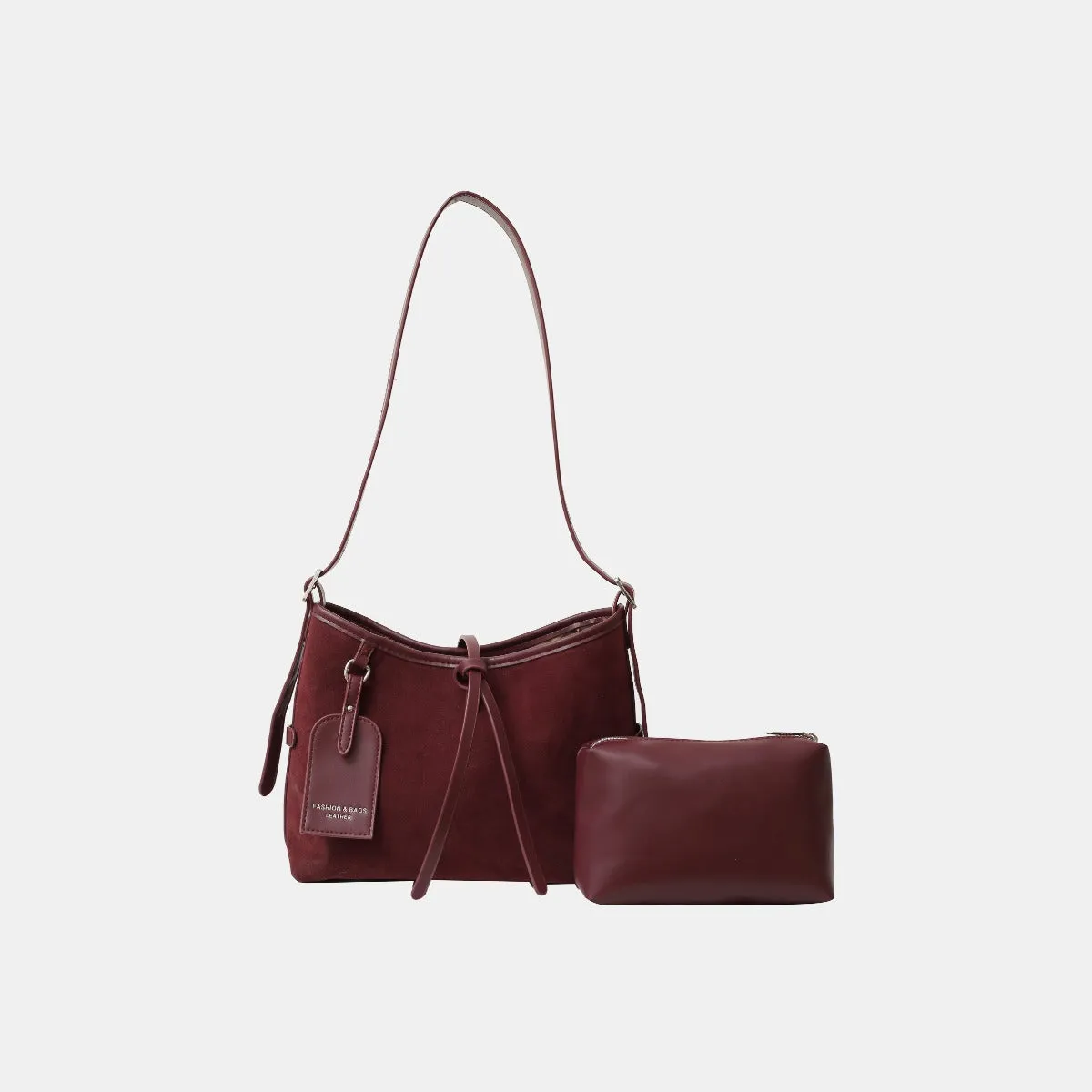 Suede Shoulder Bag and PU Leather Clutch 2 Piece Set sold by Charming Charlie