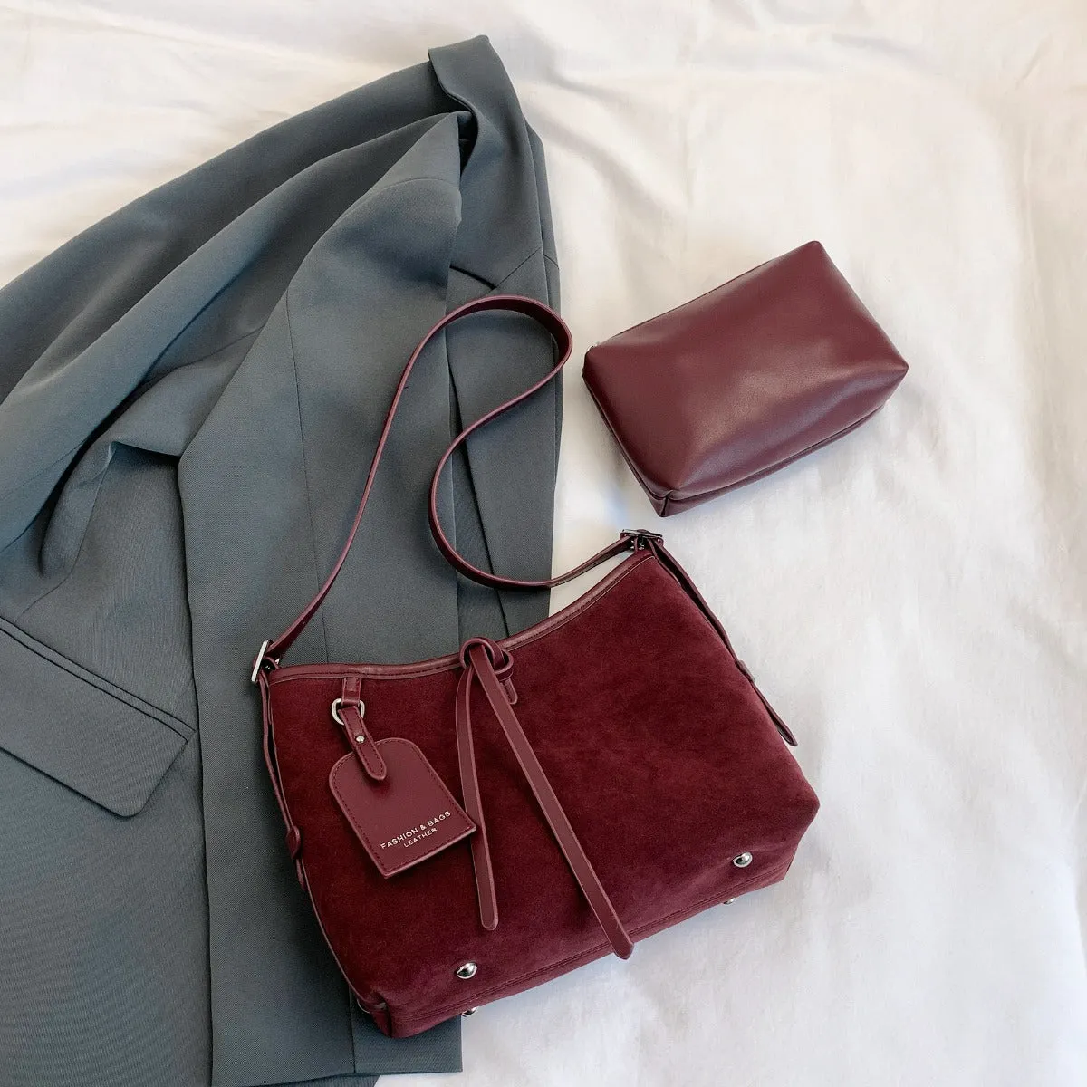 Suede Shoulder Bag and PU Leather Clutch 2 Piece Set sold by Charming Charlie product image thumbnail 2