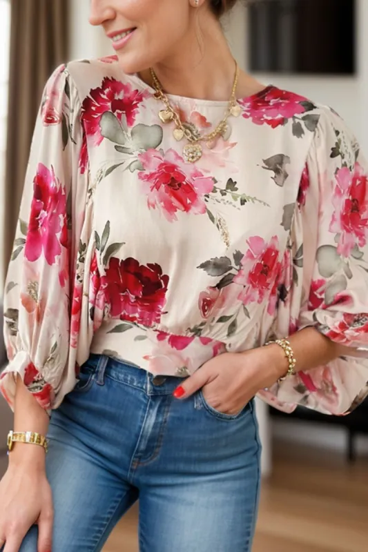 Tied Floral Round Neck Three-Quarter Sleeve Blouse sold by Charming Charlie