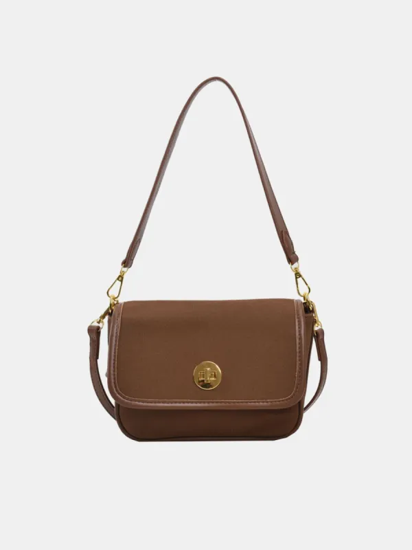 PU Leather Suede Twist-Lock Shoulder Bag sold by Charming Charlie