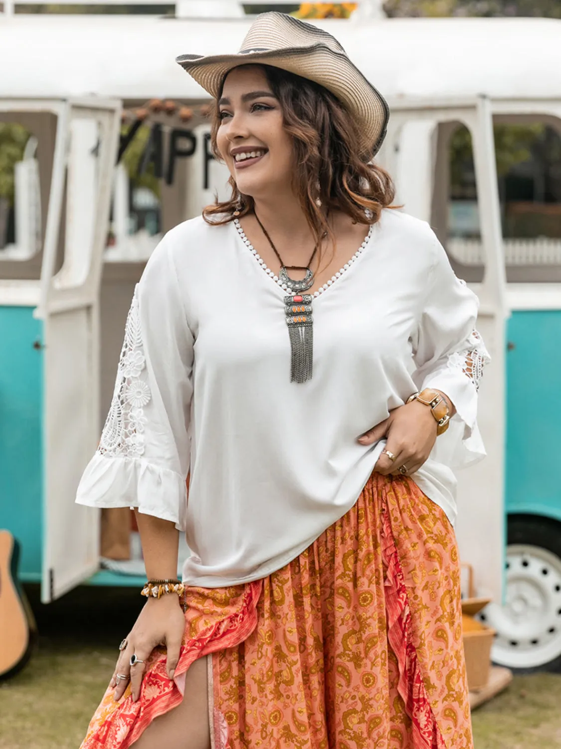 Plus Size Lace Detail V-Neck Three-Quarter Sleeve Blouse sold by Charming Charlie