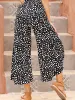 Perfee Slit Polka Dot Wide Leg Pants sold by Charming Charlie