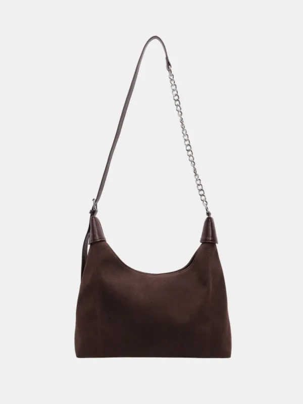 Suede Adjustable Strap Shoulder Bag sold by Charming Charlie