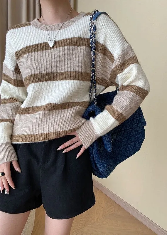 Striped round neck knit sweater sold by Charming Charlie