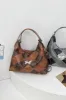 PU Leather Color Block Shoulder Bag sold by Charming Charlie