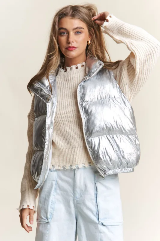 J.NNA Snap and Zipper Shiny Metallic Puffer Vest sold by Charming Charlie