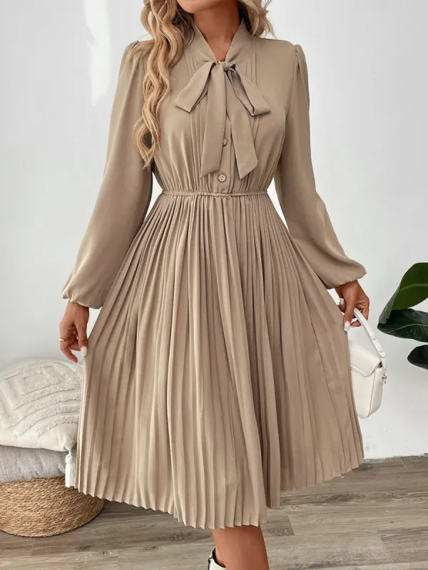 Perfee Pleated Tie Neck Long Sleeve Dress sold by Charming Charlie