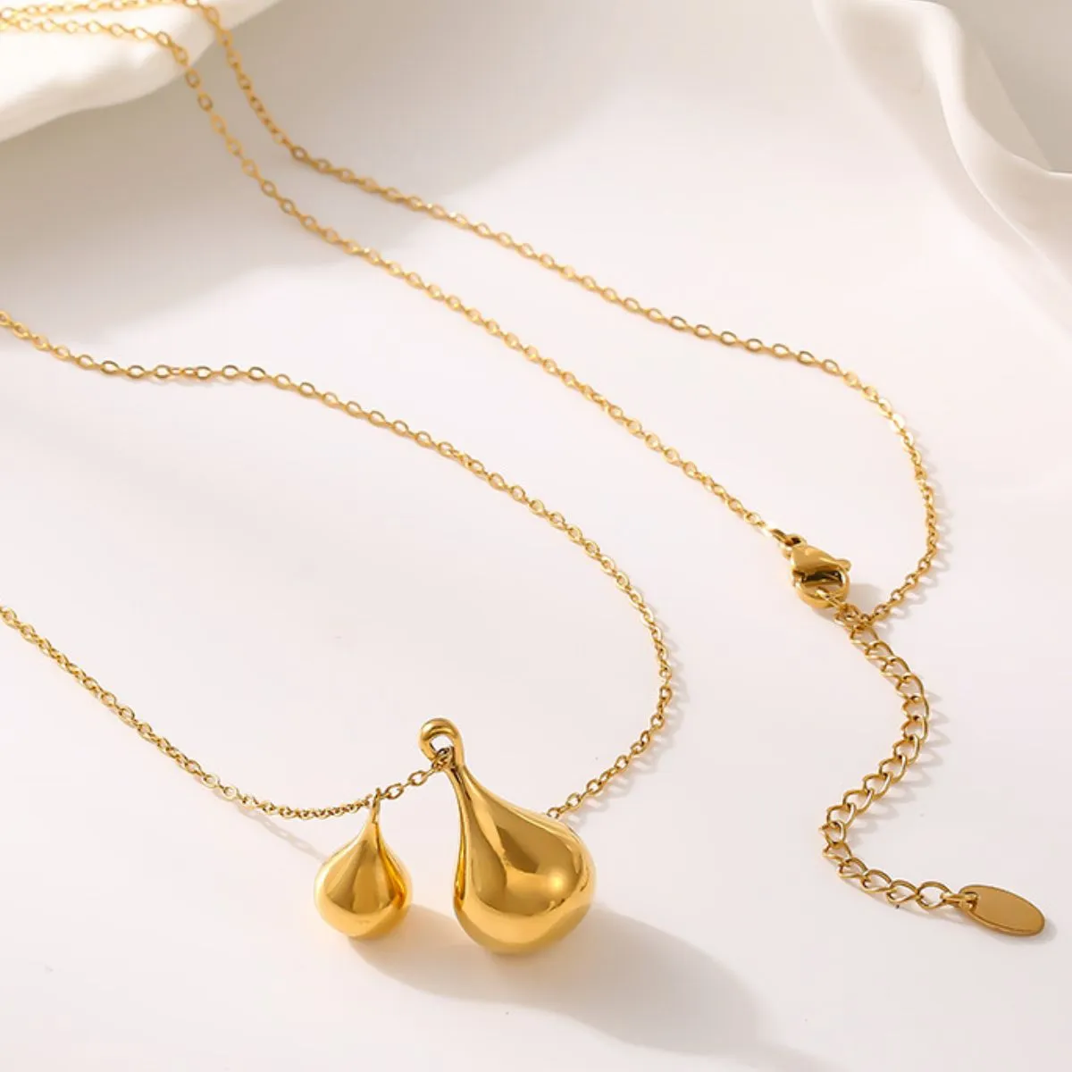 Stainless Steel Water Drop Shape Pendant Necklace sold by Charming Charlie product image thumbnail 4