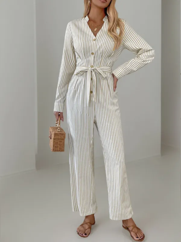 Striped Notched Long Sleeve Tie Waist Jumpsuit sold by Charming Charlie