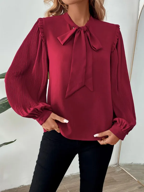 Perfee Frill Tie Neck Long Sleeve Blouse sold by Charming Charlie
