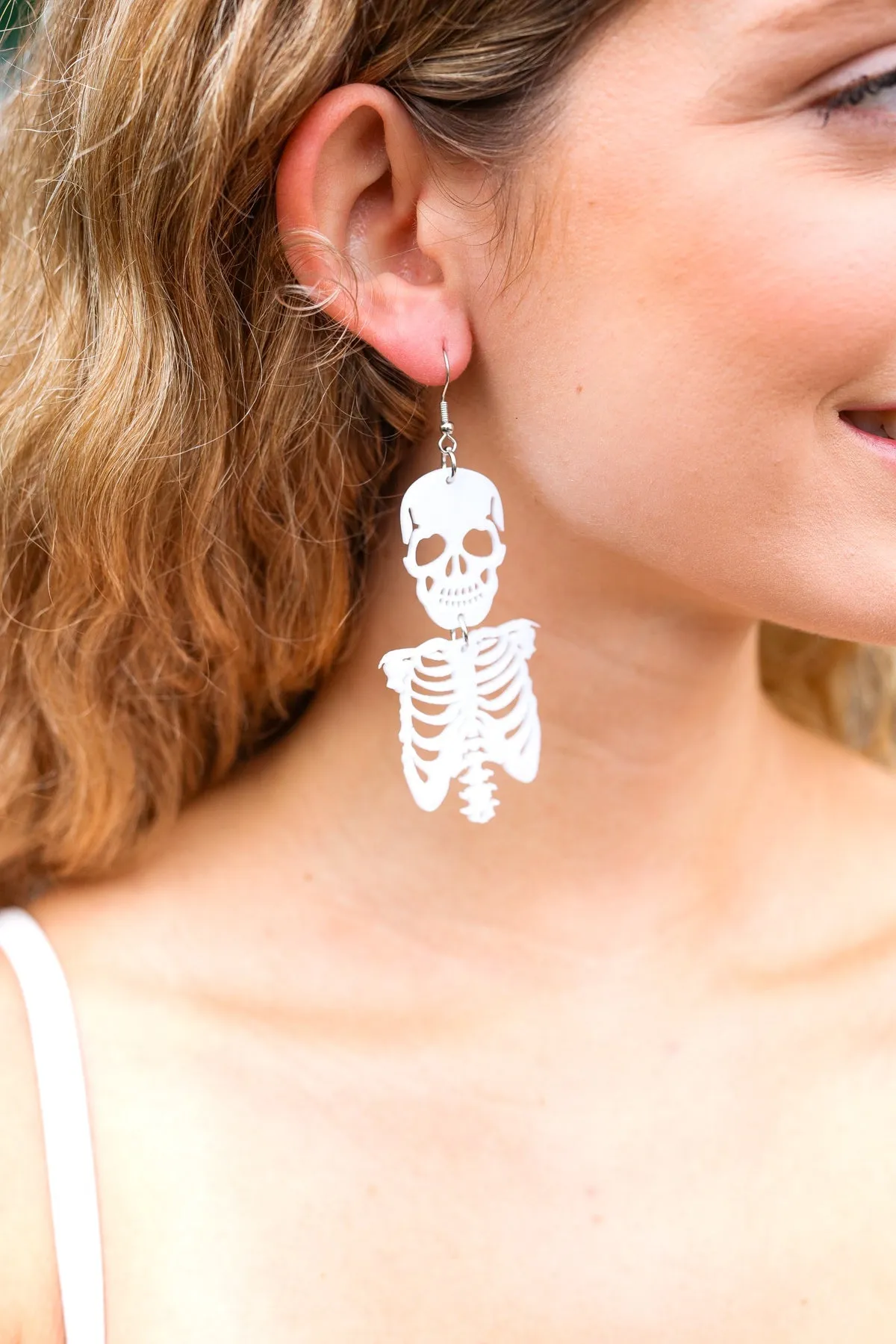 White Skeleton Acrylic Drop Earrings sold by Charming Charlie product image thumbnail 2