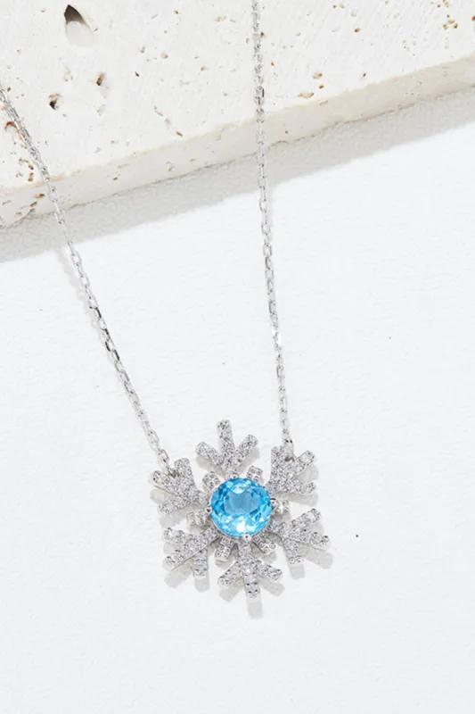 925 Sterling Silver Topaz Snowflake Shape Necklace sold by Charming Charlie