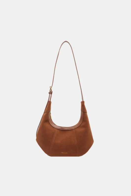 Suede Adjustable Strap Shoulder Bag sold by Charming Charlie