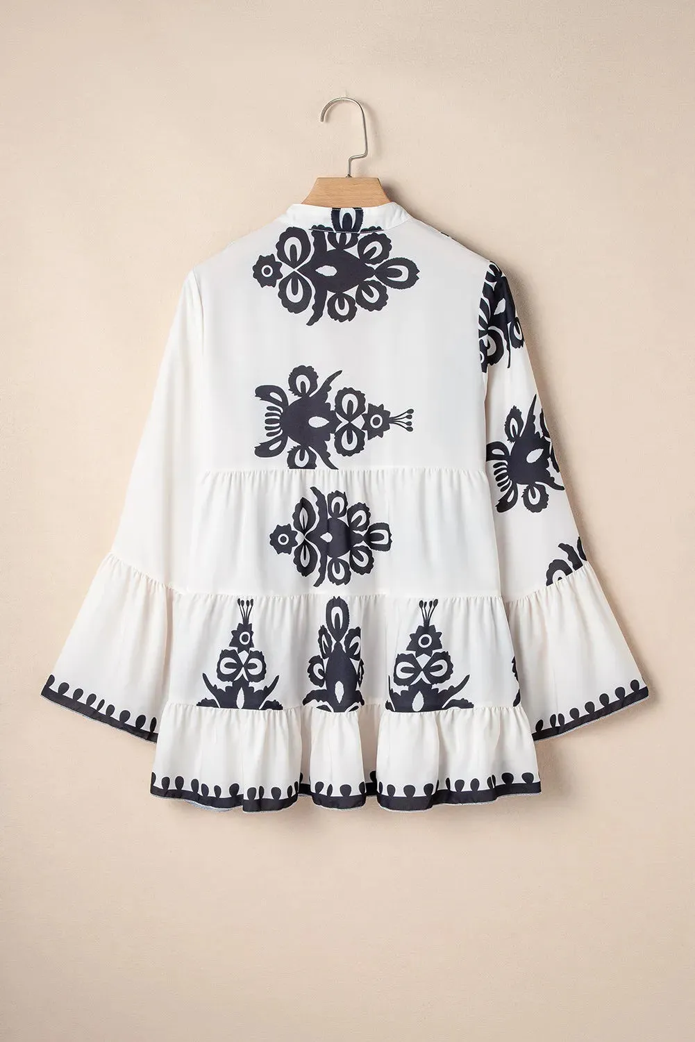 Tiered Printed Notched Long Sleeve Blouse sold by Charming Charlie product image thumbnail 3