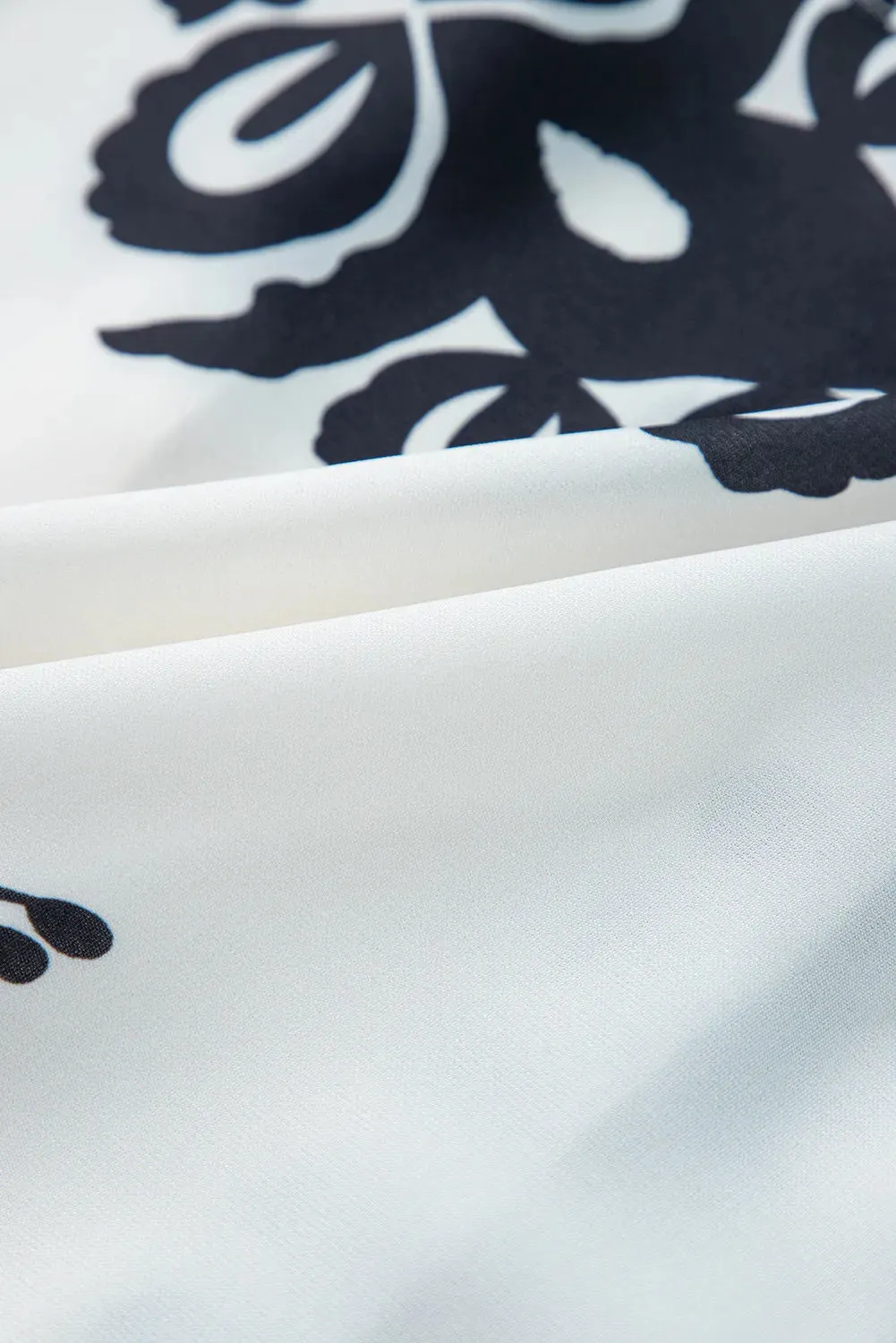 Tiered Printed Notched Long Sleeve Blouse sold by Charming Charlie product image thumbnail 4