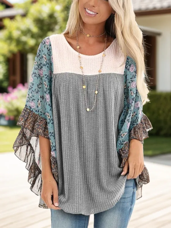 Full Size Printed Round Neck Three-Quarter Sleeve Blouse sold by Charming Charlie