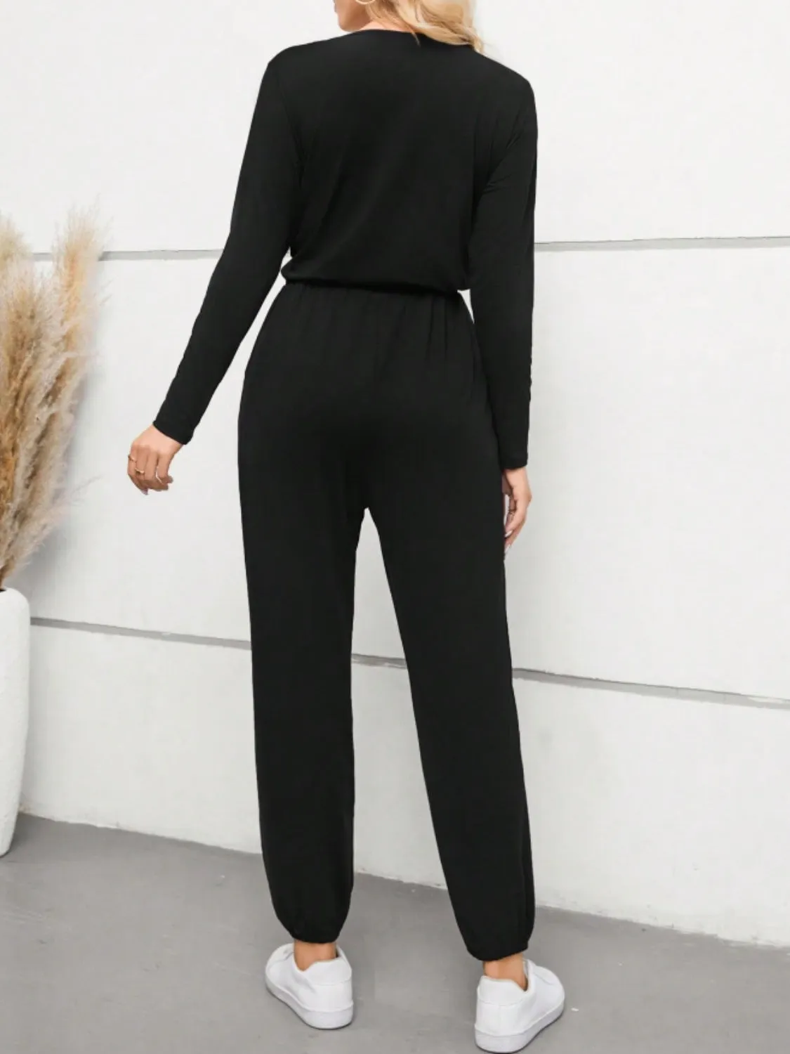 Surplice Tie Waist Long Sleeve Jumpsuit sold by Charming Charlie product image thumbnail 2