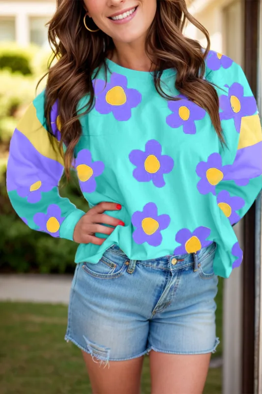 Contrast Flower Round Neck Long Sleeve Blouse sold by Charming Charlie