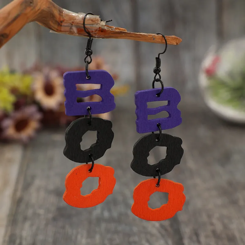 BOO Hollow Letter Wooded Earrings sold by Charming Charlie