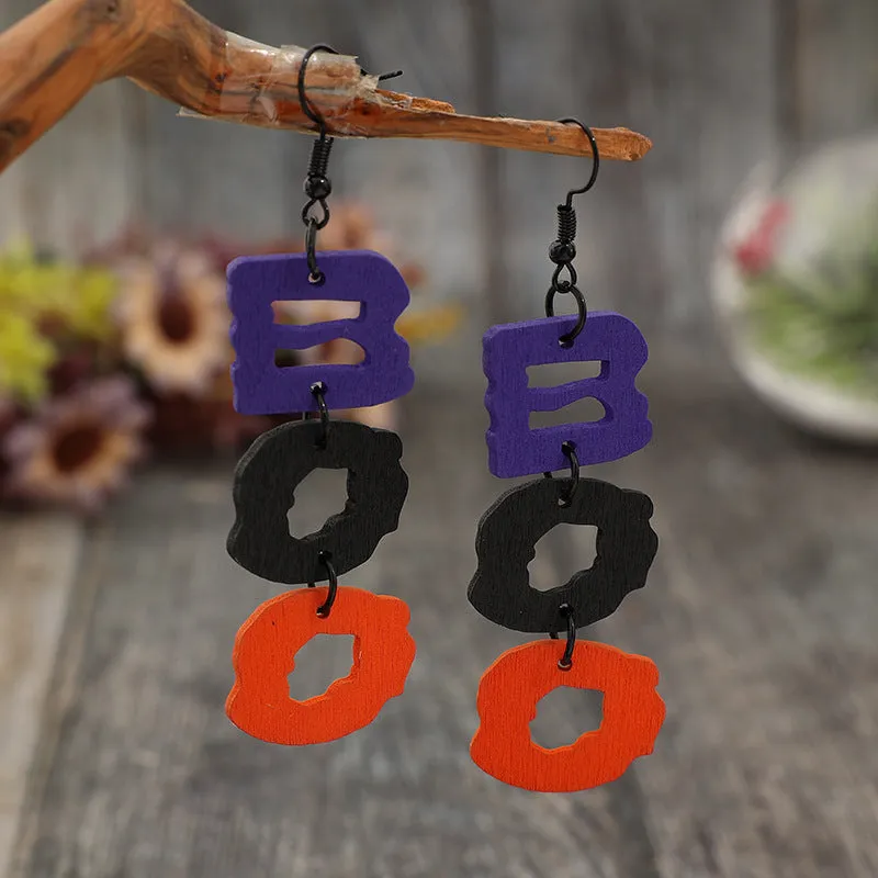BOO Hollow Letter Wooded Earrings sold by Charming Charlie