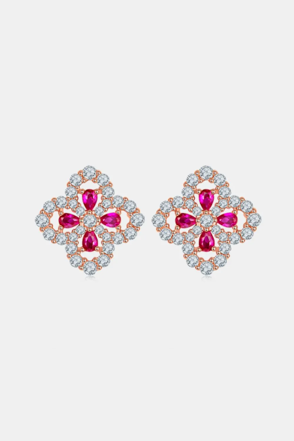 925 Sterling Silver Lab-Grown Ruby Flower Shape Stud Earrings sold by Charming Charlie