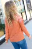 Pumpkin Pointelle Shoulder Lace Sweater sold by Charming Charlie