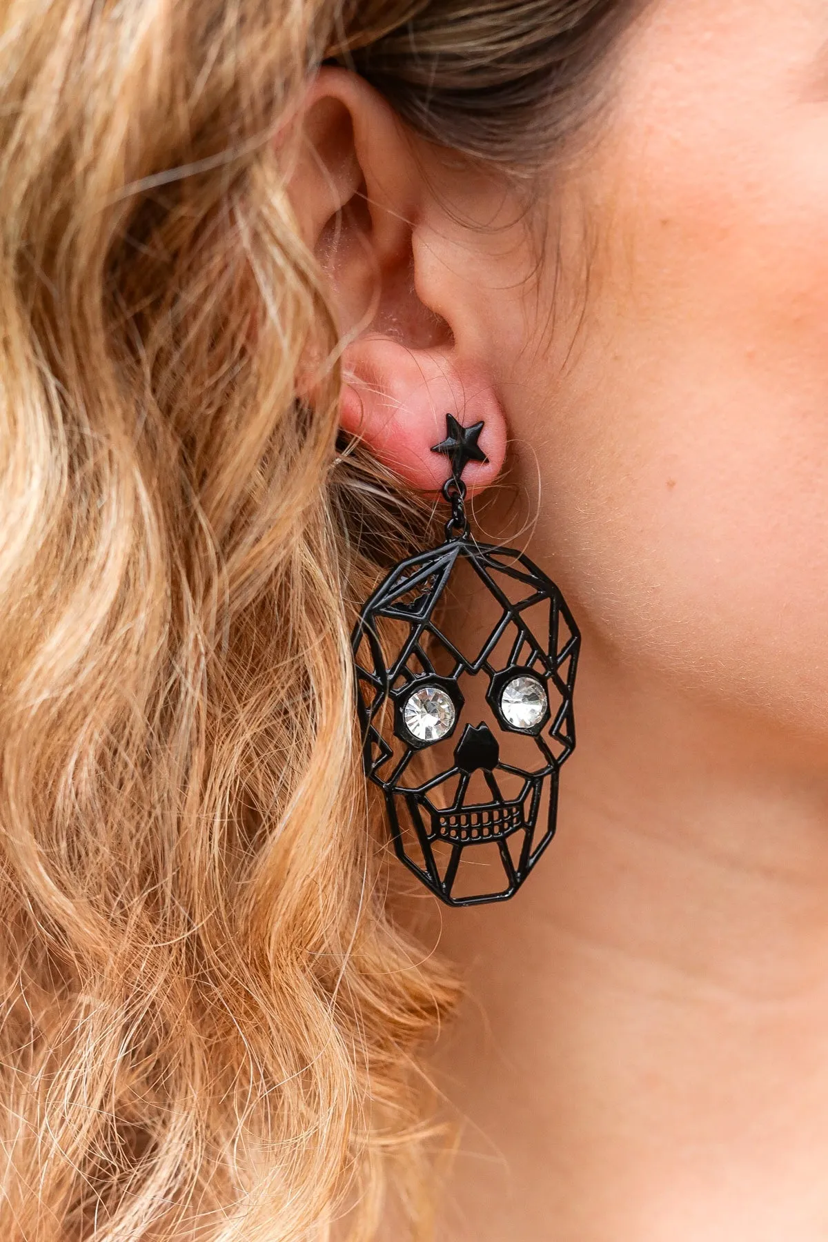 Skull Rhinestone Eyes Dangle Earrings sold by Charming Charlie product image thumbnail 2