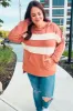 Feeling Playful Rust Stripe Color Block French Terry Hoodie sold by Charming Charlie