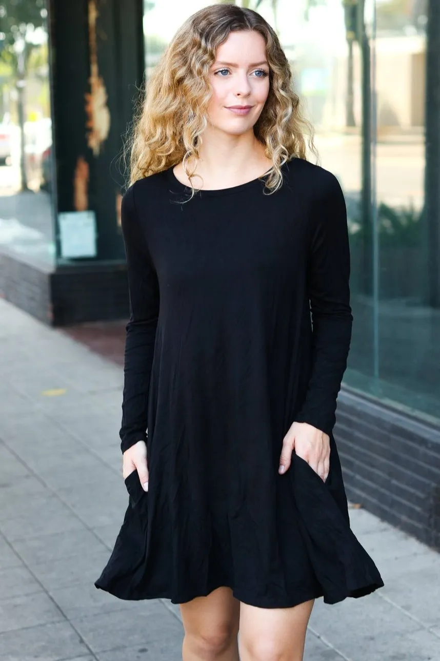 Classic Elegance Black Long Sleeve Shift Knit Dress sold by Charming Charlie